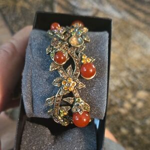 Elegant Floral Bracelet with Red and Gold Accents